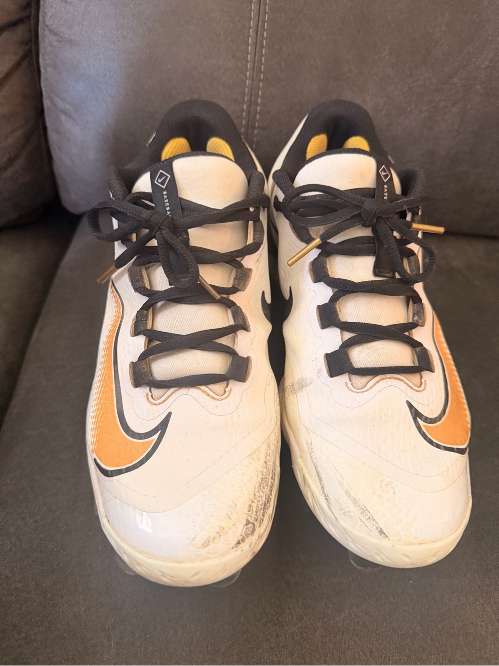 Nike Kids White and Orange Swoosh Sneakers with Black Accents